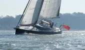 Yacht with the Red Ensign Flag